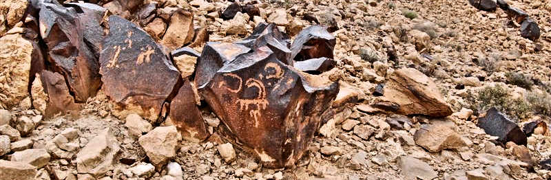 Negev Desert rock art spring sky panel showing ibex with Aries, Orion belt stars, and Scorpio